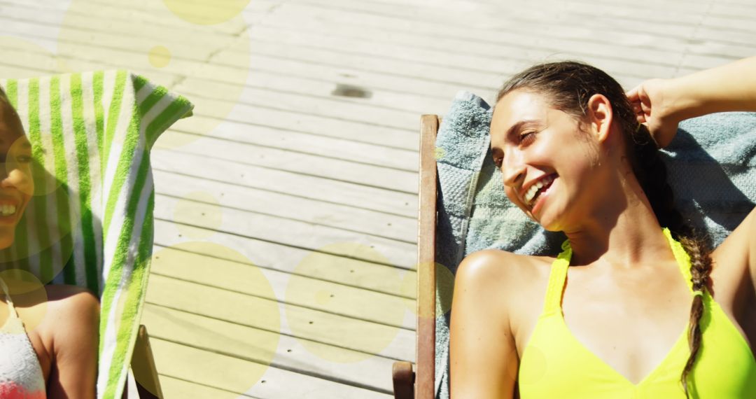 Sunny Day Relaxation: Friends Smiling on Sunbeds