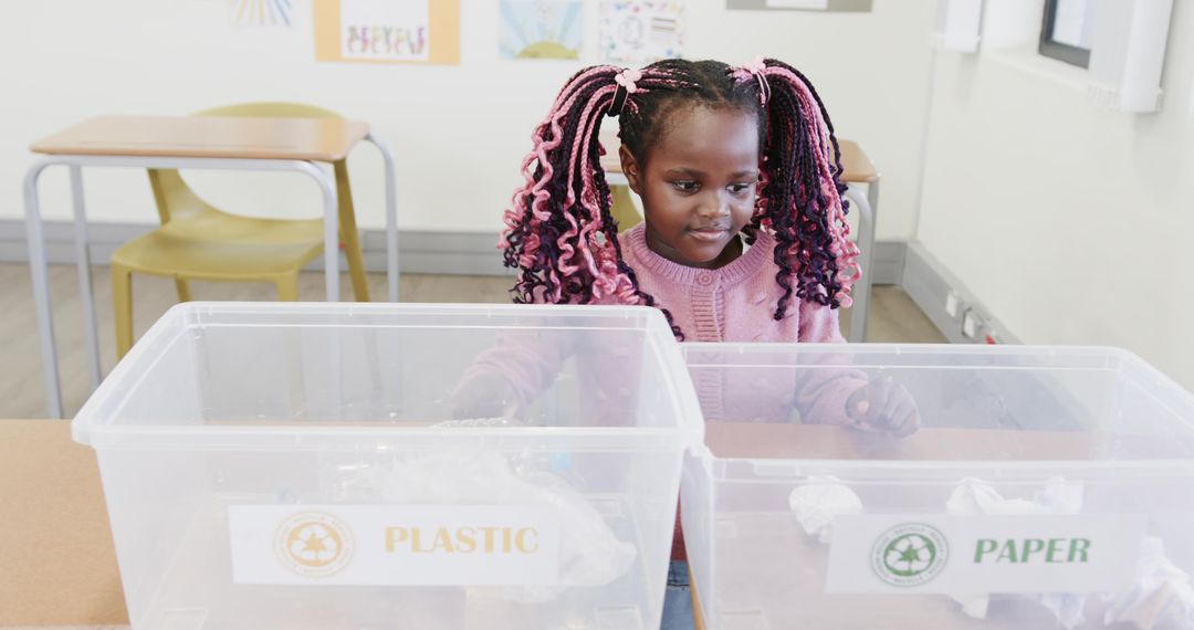 Girl Engaging in Recycling Activity in Classroom for Environmental Awareness