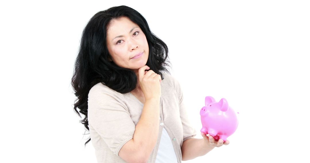 Woman Contemplating Savings with Piggy Bank Isolated on White - Free Images, Stock Photos and Pictures on Pikwizard.com