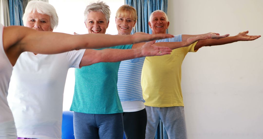 Group of Seniors Enjoying Yoga and Stretching Exercises - Free Images, Stock Photos and Pictures on Pikwizard.com