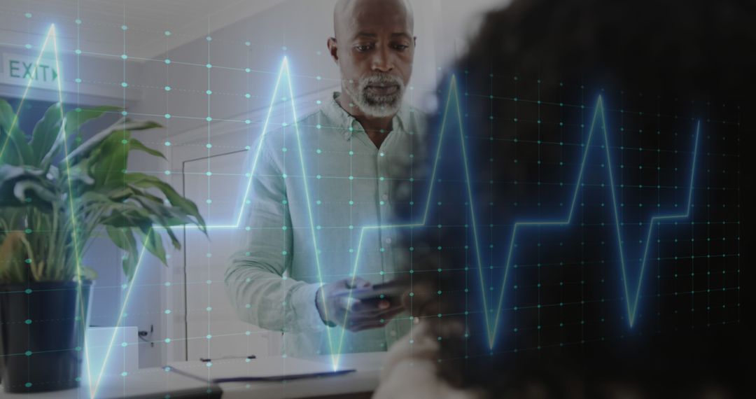 Doctor Analyzing Heartbeat Data in Modern Clinic - Free Images, Stock Photos and Pictures on Pikwizard.com