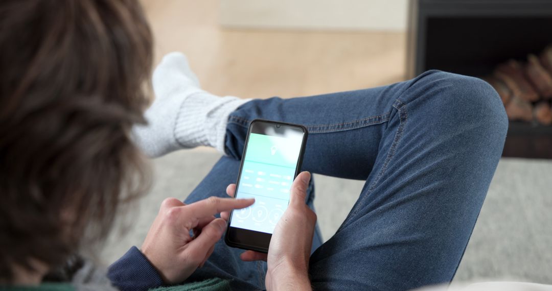 Woman Using Smartphone in Comfortable Living Room Environment