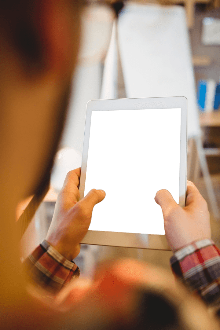 Graphic Designer Holding Transparent Tablet at Office Desk
