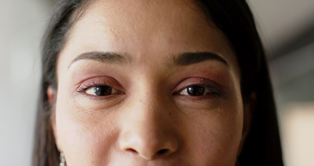 Close-Up of Person with Neutral Expression and Direct Gaze