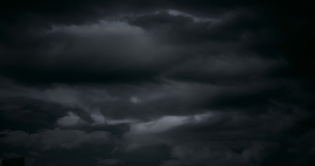 Dramatic Dark Clouds Forming Dense Cover in Sky