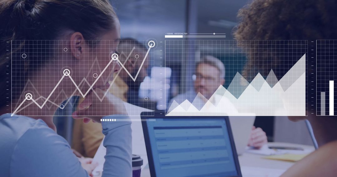 Team Analyzing Digital Financial Data in Office Environment