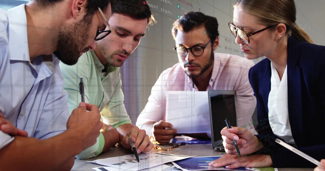 Diverse Professionals Collaborating on Financial Project