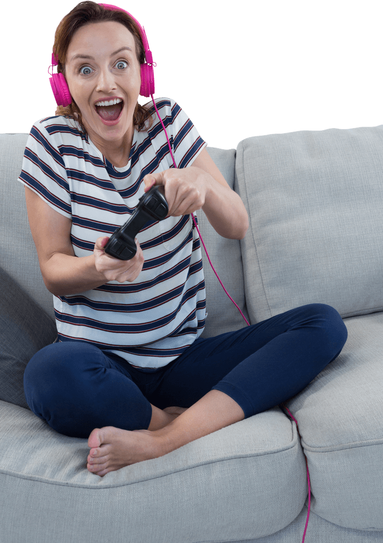 Woman Enthusiastically Playing Video Game with Headphones on Sofa Transparent