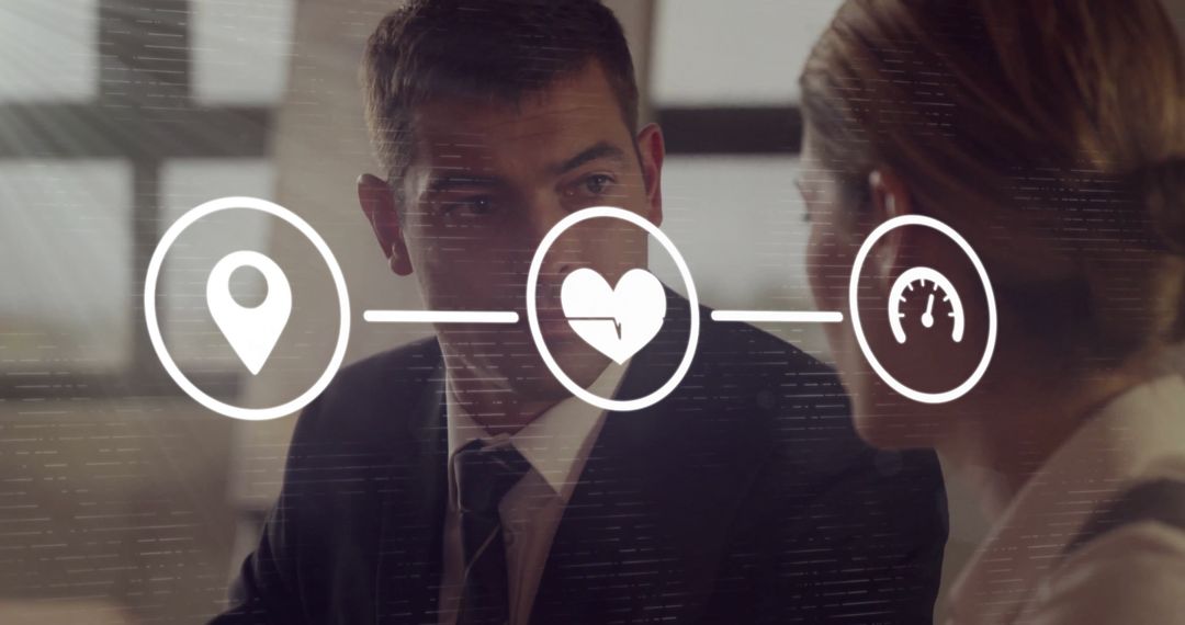 Colleagues Connecting With Digital Interface Icons in Business Meeting