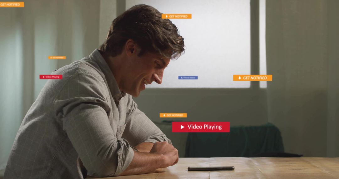 Smiling Man Engaging with Smartphone in Cozy Setting