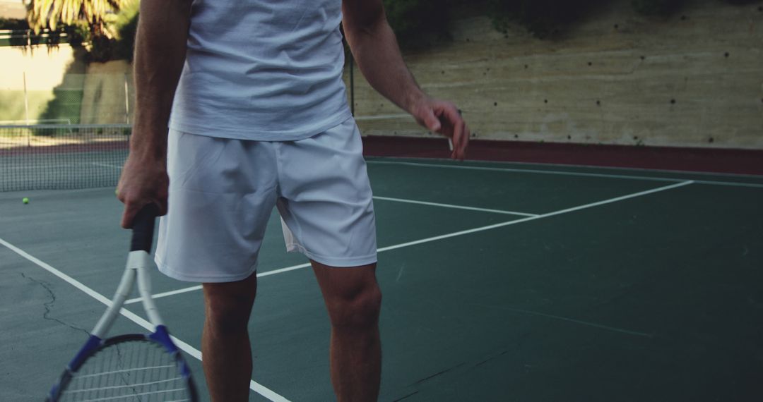 Tennis Player Holding Racquet on Court During Game - Free Images, Stock Photos and Pictures on Pikwizard.com