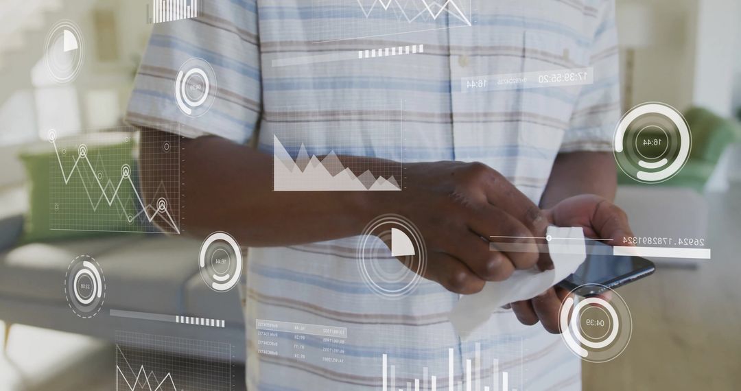 Man Cleaning Smartphone with Digital Data Overlay