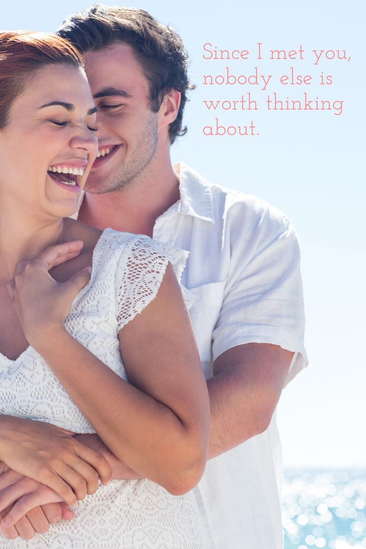 Joyful Couple Embrancing Beside Ocean with Affectionate Quote