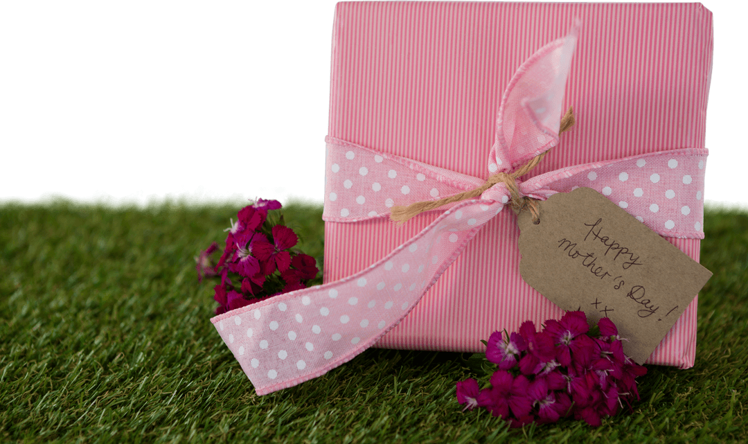 Transparent Delicate Gift Box on Grass with Mother's Day Tag