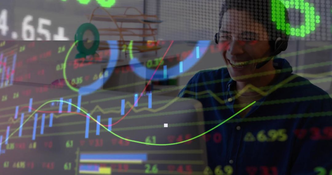 Smiling Asian Man Analyzing Stock Charts with Digital Technology