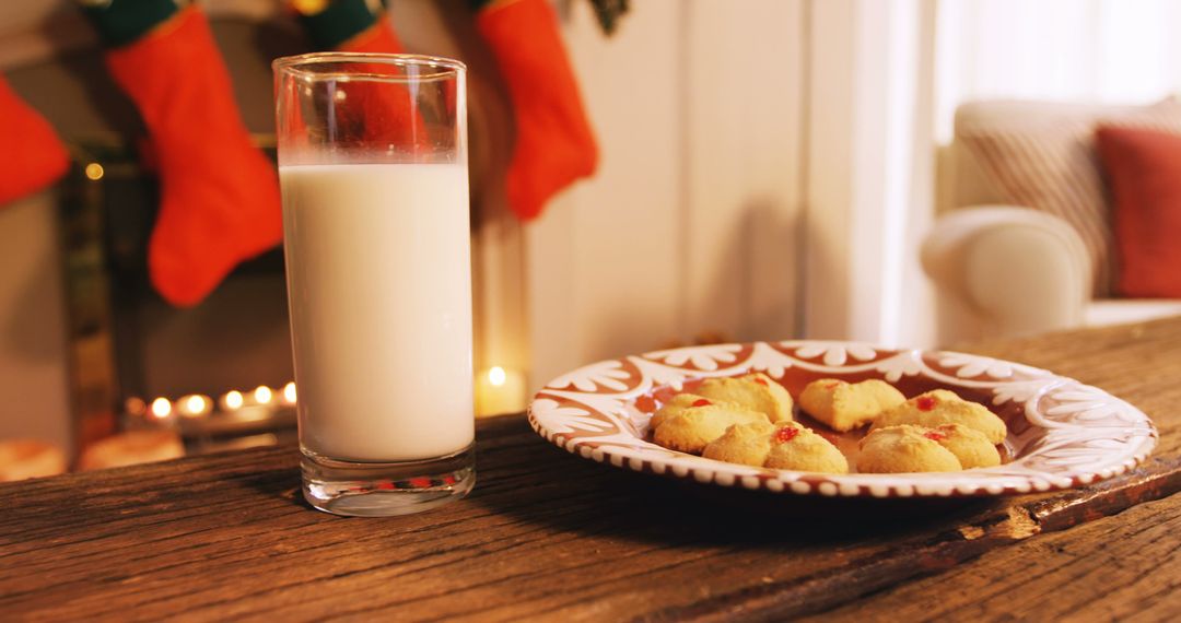 Gingerbread cookies with a glass of milk on wooden table during christmas time 4k - Free Images, Stock Photos and Pictures on Pikwizard.com