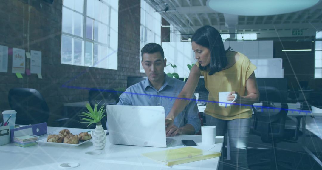 Colleagues Collaborating in Modern Workspace on Business Project