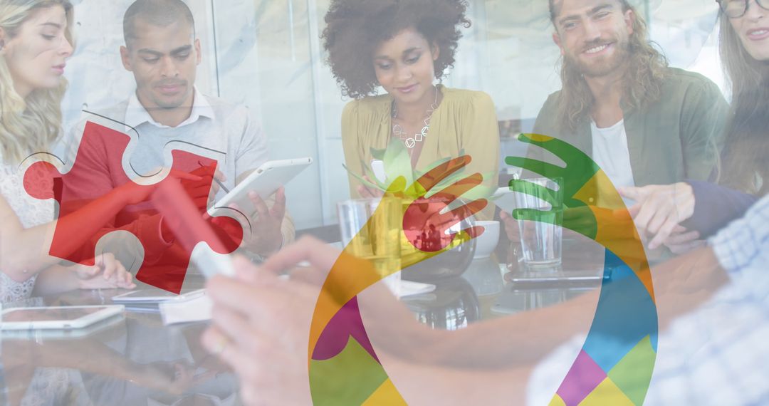 Diverse Team Collaborating Using Technology in Modern Office