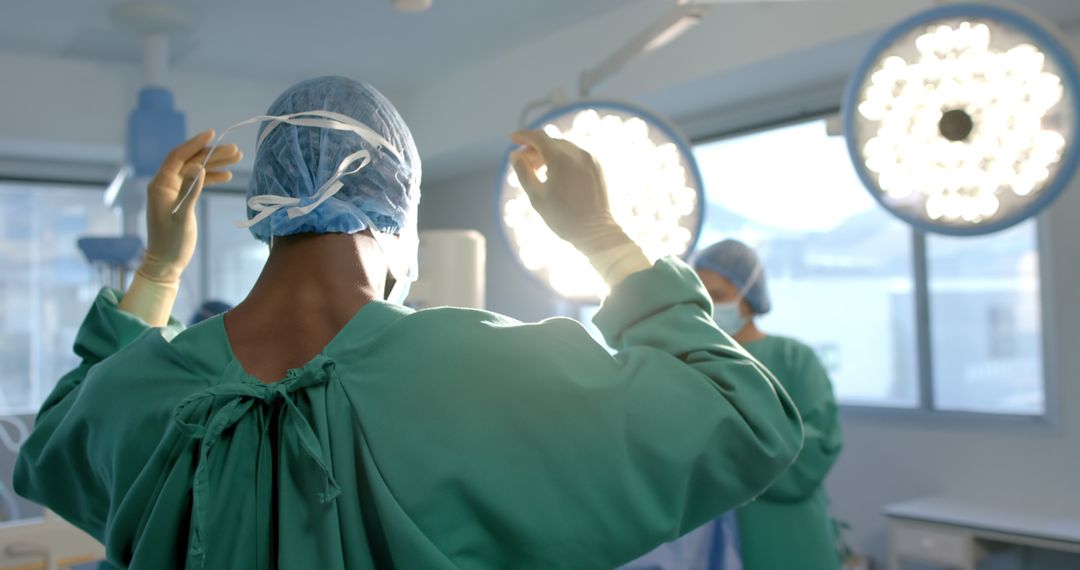 Surgeon Preparing for Operation in Operating Theater