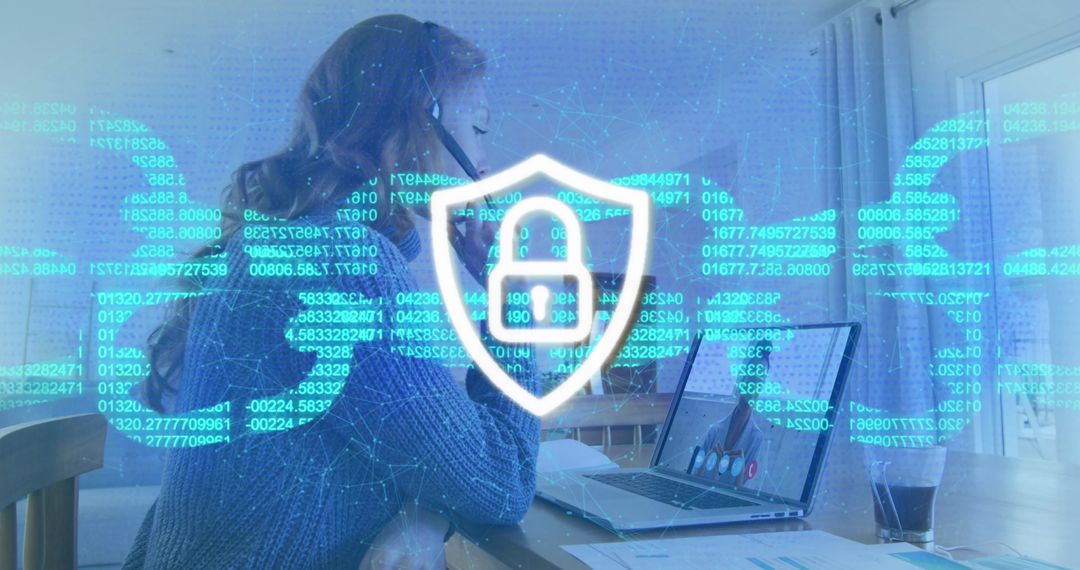 Digital Security Shield Overlay on Businesswoman with Laptop