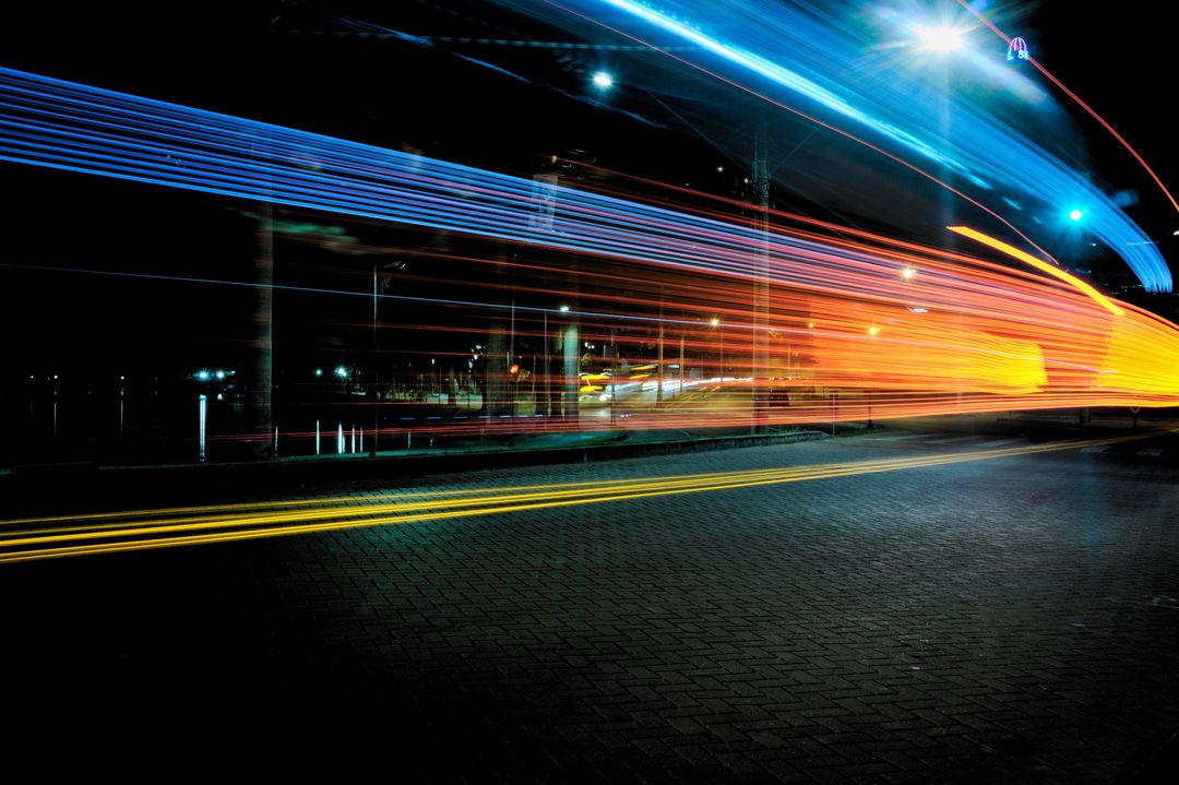 Dynamic Urban Night Stoplight Painted Trails from Speeding Vehicles