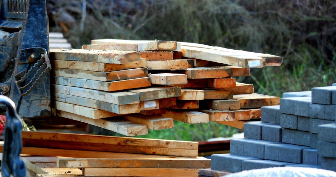 Forklift Loading Lumber at Construction Site - Free Images, Stock Photos and Pictures on Pikwizard.com