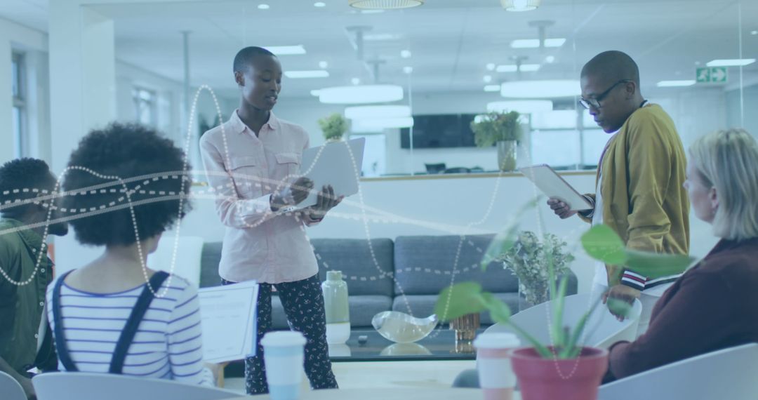 Diverse Team Collaborating with Digital Data Visualization