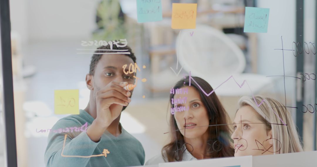 Diverse Team Collaborating in Office Brainstorming Session