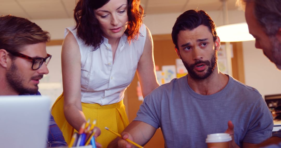 Diverse Team Actively Collaborating in Modern Office