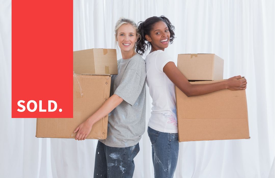 Two Women Joyfully Holding Moving Boxes Celebrating New Home Purchase - Download Free Stock Templates Pikwizard.com