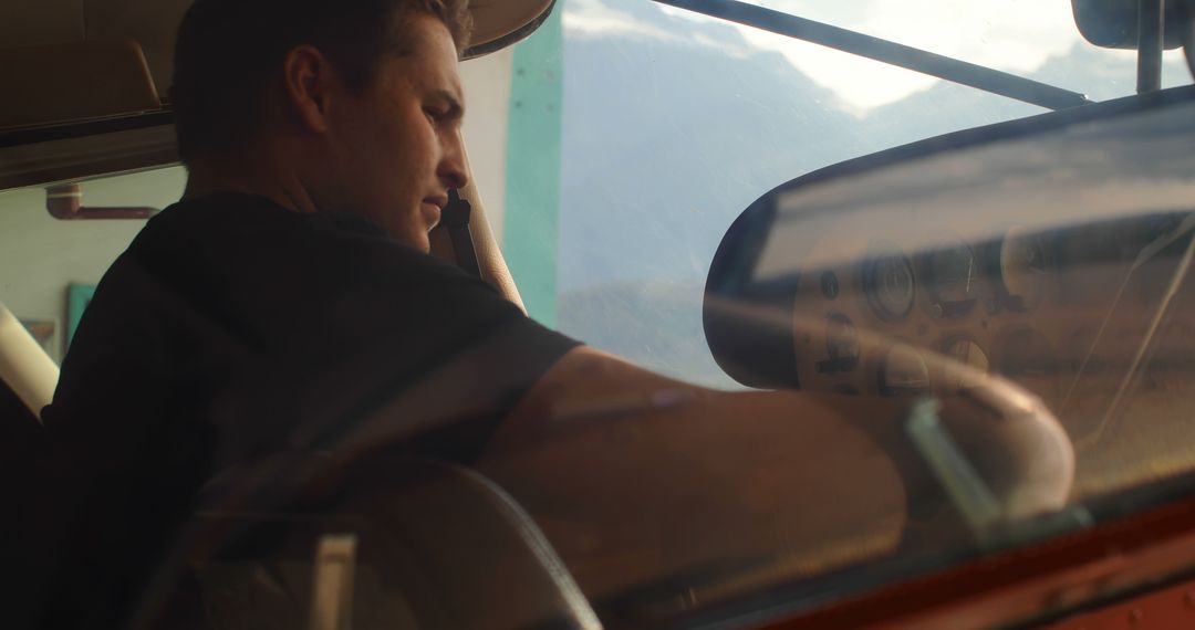 Pilot Communicating with Control Team in Aircraft Cockpit