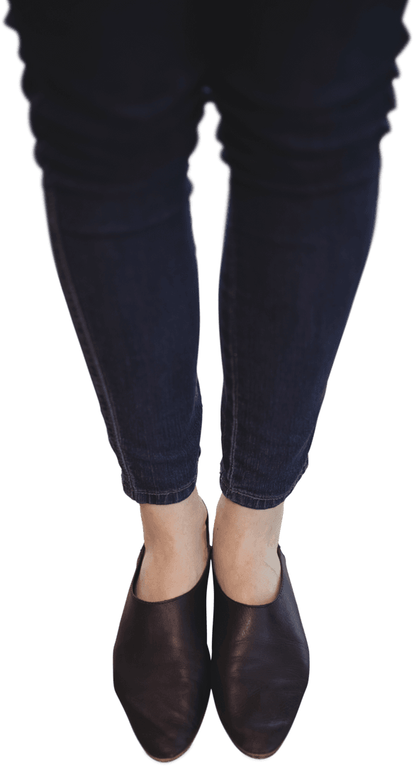 Transparent View of Businesswoman's Legs in Dark Jeans and Shoes
