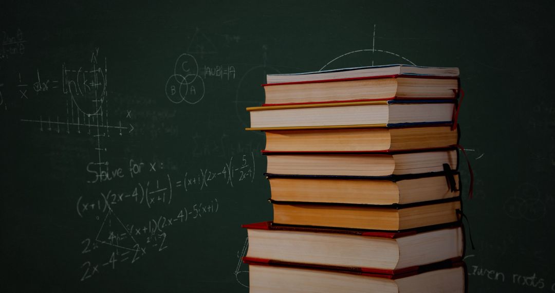 Stack of Books Against Chalkboard with Mathematical Equations - Free Images, Stock Photos and Pictures on Pikwizard.com