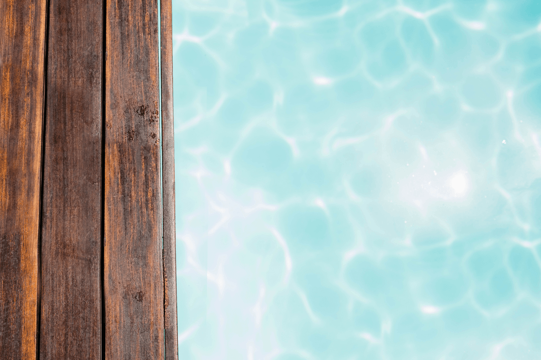 Transparent Pier by Sparkling Swimming Pool Surface