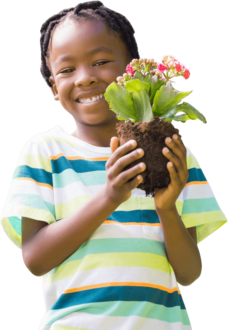 Smiling Child Holding Small Plant Against White Background