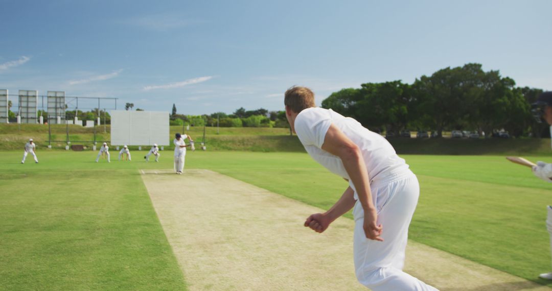 Bowling Action in Competitive Cricket Match on Sunny Day - Free Images, Stock Photos and Pictures on Pikwizard.com