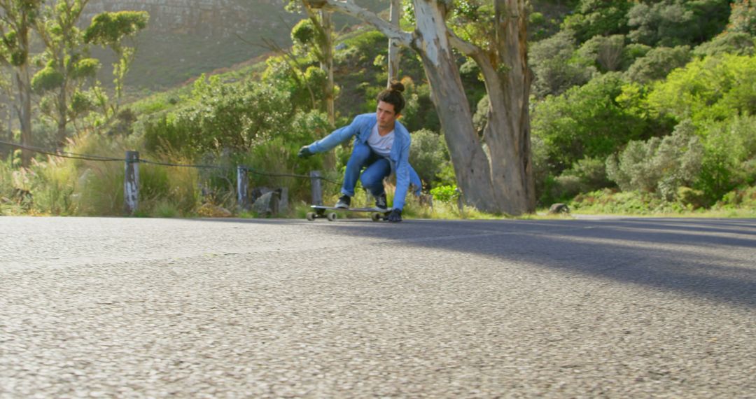 Young Woman Riding Longboard on Country Road - Free Images, Stock Photos and Pictures on Pikwizard.com