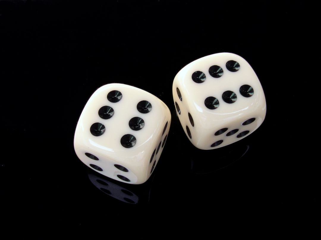 Pair of White Dice with Black Dots on Black Background - Free Images, Stock Photos and Pictures on Pikwizard.com