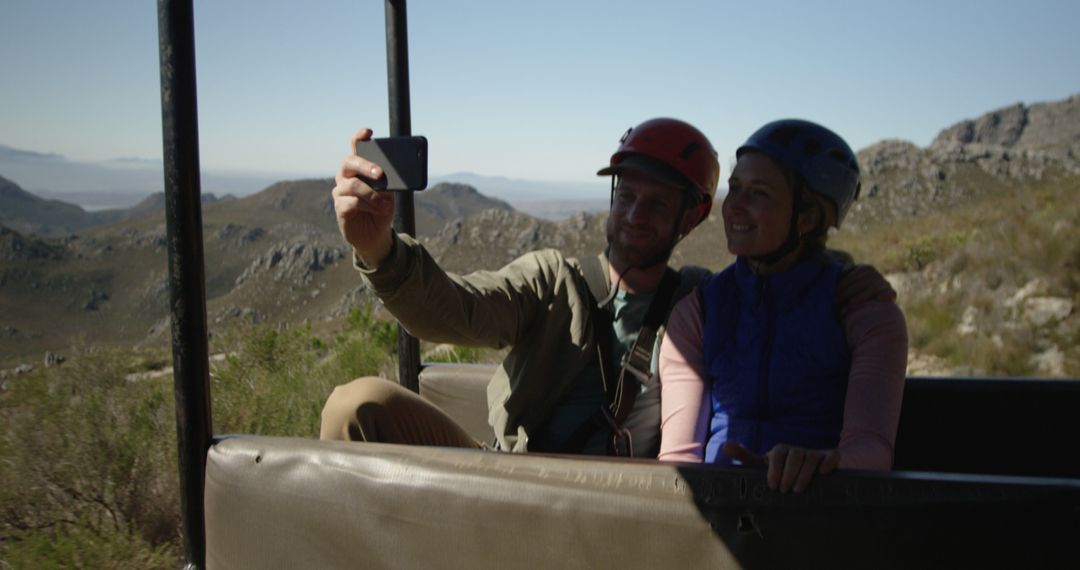 Couple Having Fun Taking Selfie in Mountain Adventure