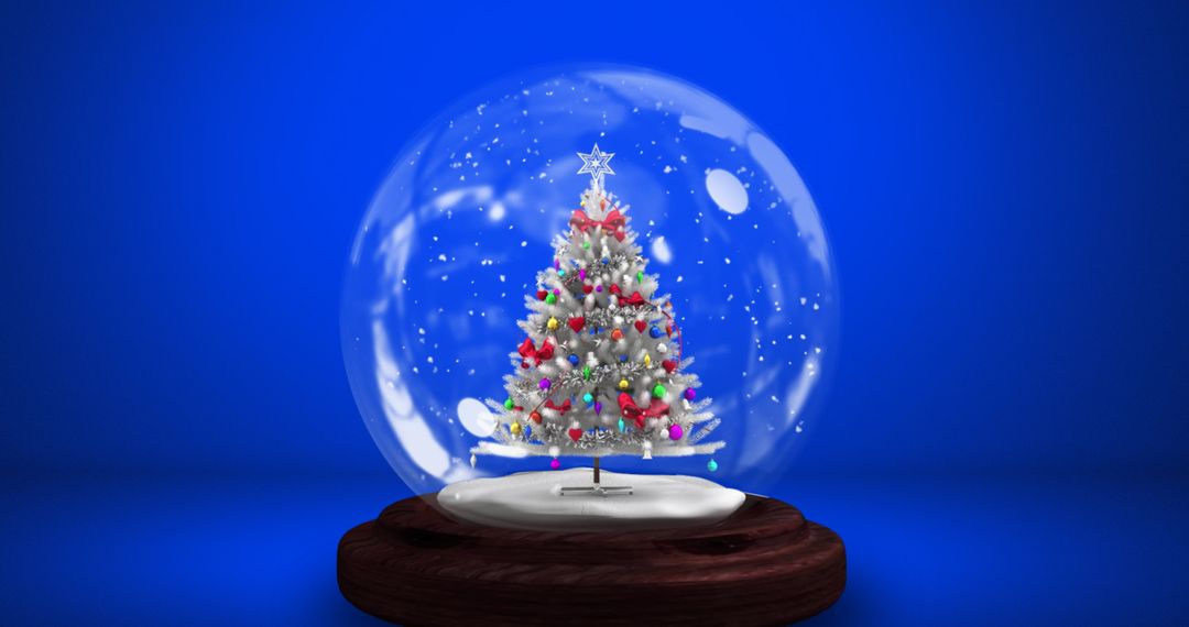 Christmas Tree in Snow Globe with Snowfall and Blue Background - Free Images, Stock Photos and Pictures on Pikwizard.com