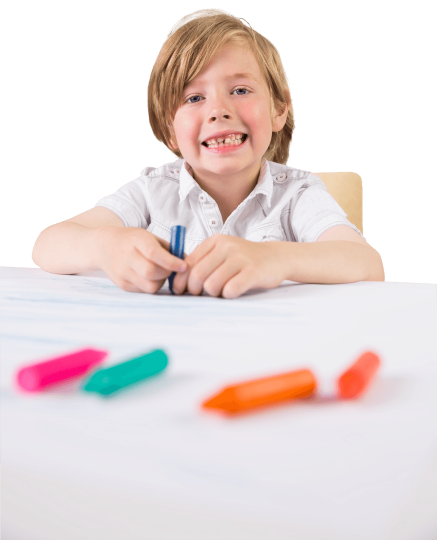 Smiling Young Boy Drawing on Transparent with Colorful Crayons