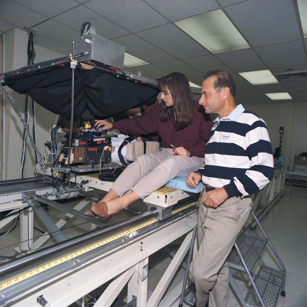 Scientists Conduct Neurovestibular Study with Oscillating Sled Device in Laboratory, 1993 - Free Images, Stock Photos and Pictures on Pikwizard.com