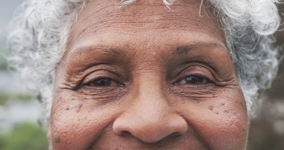 Close-Up Portrait of Senior African American Woman with Warm Smile - Free Images, Stock Photos and Pictures on Pikwizard.com