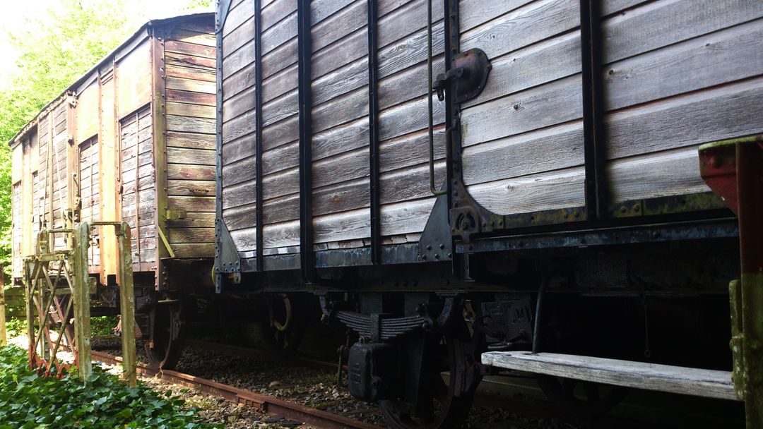 Vintage Wooden Freight Train Cars on Rusted Tracks - Free Images, Stock Photos and Pictures on Pikwizard.com
