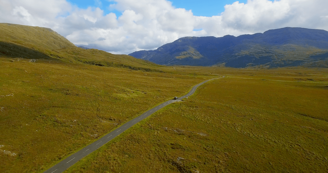 Transparent Road Winding Through Scenic Vivid Landscape