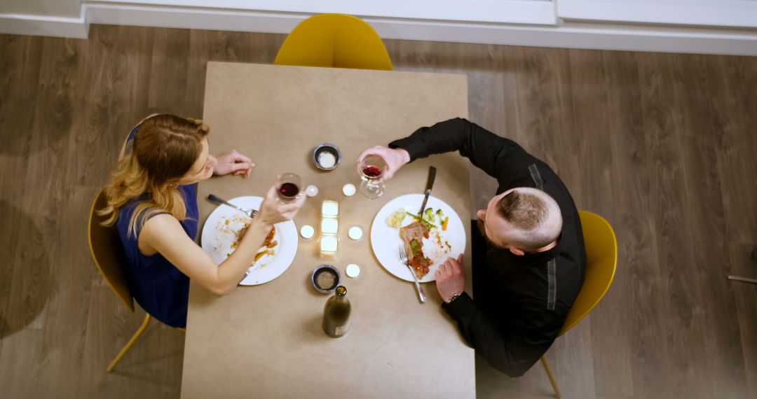 Top View of Couple Dining Together at Home Table