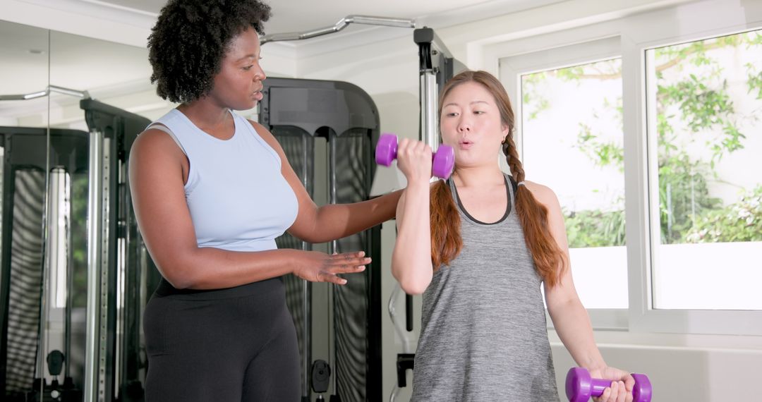 Multicultural Personal Training Session with Dumbbells