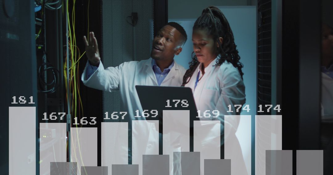 it engineers analyzing server data in computer room - Free Images, Stock Photos and Pictures on Pikwizard.com