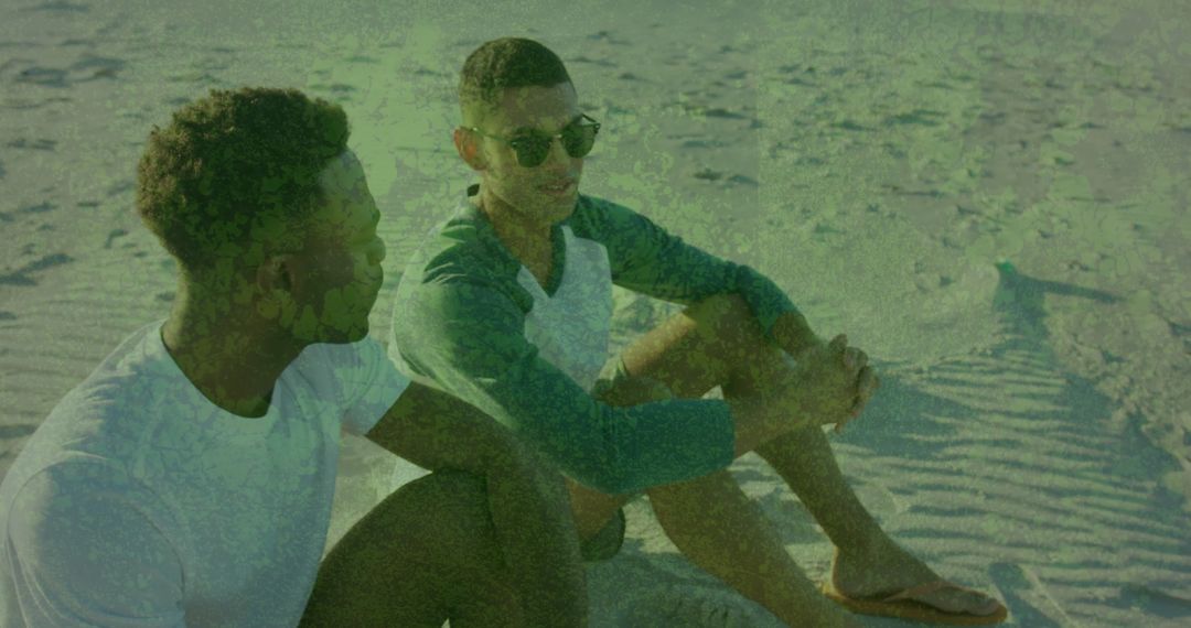 Friends Relaxing and Conversing on Sandy Beach