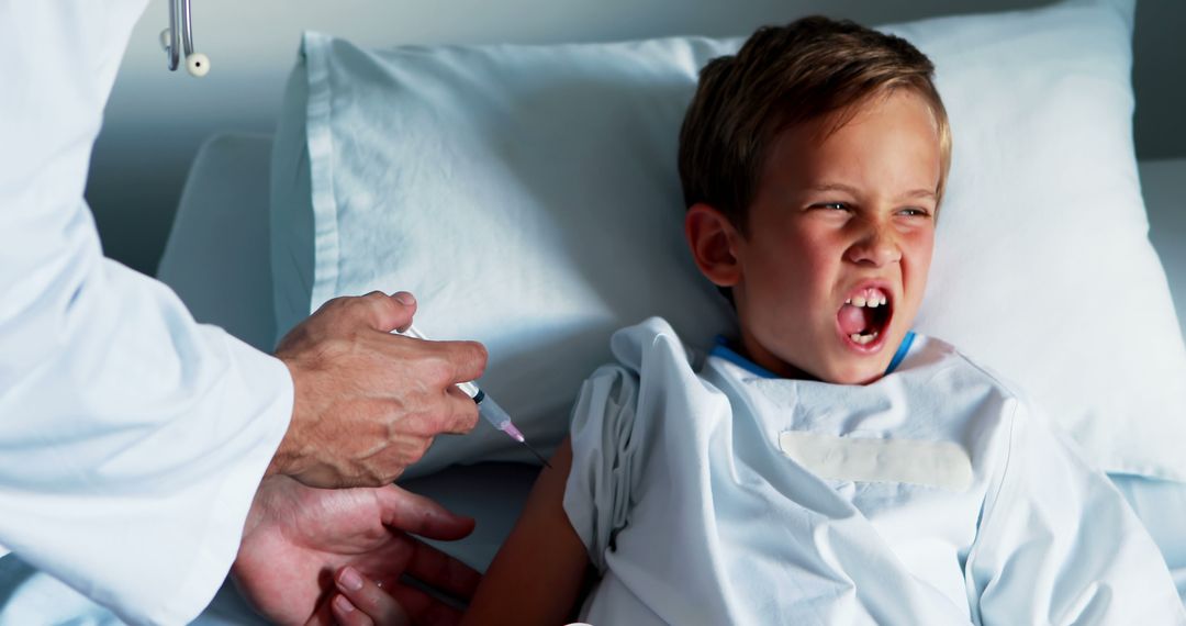 Doctor Giving Child Vaccine Injection in Hospital Bed - Free Images, Stock Photos and Pictures on Pikwizard.com